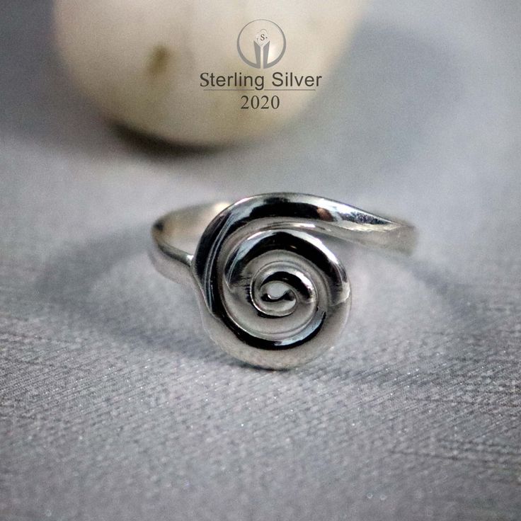 Coupon, 70% off when you buy 5 items https://www.etsy.com/in-en/shop/Sterlingsilver2020?coupon=BUY5ITEMSGET70OF We are made of 925 Sterling Silver by Hands Spiral Silver Ring , 925 Sterling Silver Ring , Statement Ring , Handmade Ring , Women Ring , Spiral Ring , Promise Ring , Right Hand Ring Ring Style: Statement Ring/ Heart Ring Metal: 925 Sterling Silver Ring Size: 4- 14 US Weight: 5-12 Gm Approx Occasion : Birthday Events, Lovely Valentine's Day Gift, Anniversary Gift, Weeding Gift, Engagement , Lover Gift, Hen Party And Other Occasion. Celebration: Christmas Day Gift, Mother's Day Gift, Father's Day Gift, Friendship Day Gift, Easter Sunday And Other Celebration  ✈ Free Shipping (UPS, Dhl) 🎁 Free Gift Box ✈ ✈ Shipping Services✈ ✈  ✔We ship the item through Dhl eCommerce, UPS shipping Handmade Sterling Silver Spiral Rings, Spiral Sterling Silver Ring Stamped 925, Minimalist Sterling Silver Spiral Ring, Minimalist Spiral Sterling Silver Ring, Spiral Stackable Sterling Silver Rings For Gift, Sterling Silver Swirl Rings For Gift, Spiral Sterling Silver Promise Ring, Spiral Stackable Sterling Silver Rings As Gift, Sterling Silver Spiral Stackable Rings As A Gift