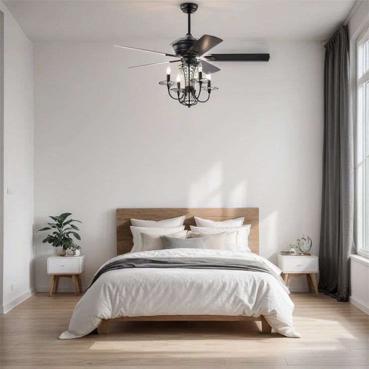 a bedroom with a bed, ceiling fan and two planters on the side of the wall