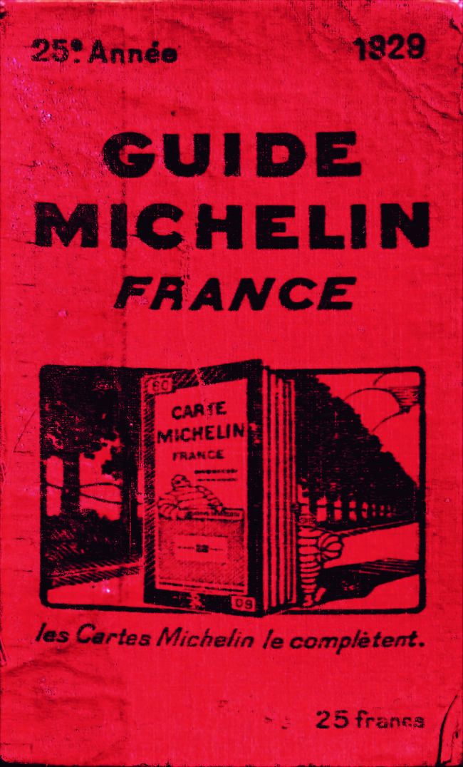 a red book with the title guide michel france written in black and white on it