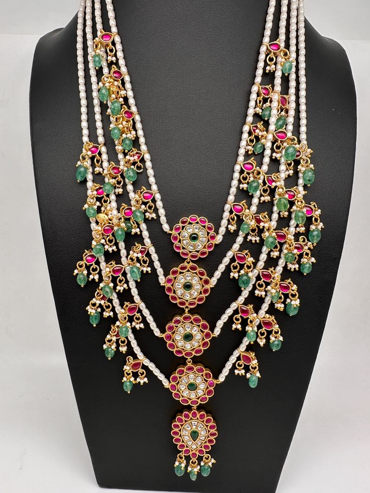 Traditional Multi Layer Pearls Necklace in Jadau Kundan. Four Strands of Rice Pearls.  Real look alike necklace. Premium quality and craftmanship. Necklace length : 24 Inches comes with adjustable back Thread (dore). No Earrings. Ready to ship from Boston, Massachusetts. If you have any questions, please let me know. Thank You!! Adjustable Long Traditional Necklace, Adjustable Traditional Long Necklace, Long Necklace With Latkans, Traditional Multi-strand Wedding Necklace, Traditional Wedding Necklace With Adjustable Chain, Traditional Multi-strand Festive Jewelry, Traditional Multi-strand Festival Jewelry, Traditional Multi-strand Jewelry For Festivals, Festive Multi-strand Necklace For Festivals