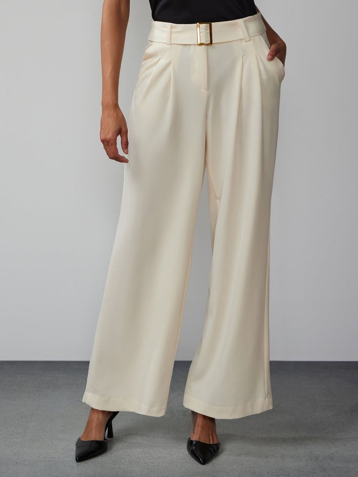 Achieve a timeless and versatile style that suits any occasion in this chic pair of pants. Crafted with meticulous attention to detail, these pants feature a high rise waist, elegant pleats, and a flattering wide leg silhouette that exudes sophistication. Pair them with a tucked-in blouse and heels for a polished office look. Elegant Wide Leg Bottoms For Semi-formal Occasions, Relaxed Fit Wide Leg Bottoms For Semi-formal Occasions, Pleated High-waist Wide Leg Pants, Formal Wide Leg Dress Pants, Elegant Pleated Wide Leg Pants For Summer, Chic Pleated Wide-leg Bottoms, Chic High Waist Pleated Bottoms, Chic Pleated Wide Leg Bottoms, Elegant Straight Workwear Pants