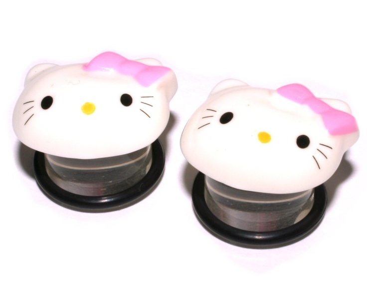 two hello kitty ear plugs with pink bows on them