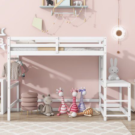 a child's bedroom with pink walls and white bunk beds, stuffed animals and toys