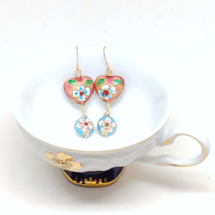 Delicately crafted cloisonné baubles featuring vibrant pinks and blues with daisy motifs. 2 1/2" long. Gold-plated ear wires. Abalone Earrings, Kids Earrings, Flower Child, Ear Wires, Gift Necklace, Ring Earrings, The Dreamers, Necklaces Bracelets, Daisy