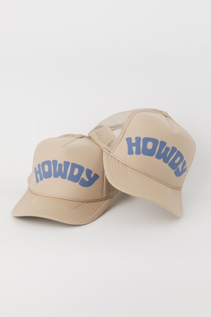 Classic Howdy trucker hat. Screen printed "Howdy" art on the front foam panel. High crown fit with adjustable snapback closure. Features- Puff "Howdy" Screenprint- Adjustable Fit- High Crown Mesh Trucker Content + Care- 100% Polyester Front; 100% Polyester Mesh Back- Spot clean- Domestic Adjustable Trucker Hat With Graphic Print And Curved Brim, Trucker Hat With Letter Print And Flat Bill, Adjustable Trucker Hat With Letter Print And Flat Brim, Adjustable Snapback Trucker Hat With Letter Print, Adjustable Snapback Hat With Graphic Print, Graphic Print Trucker Hat With Curved Brim, Graphic Print Snapback Hat With Curved Bill, Flat Brim Trucker Hat With Letter Print, Graphic Print Snapback Hat