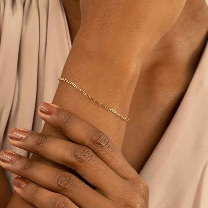 The perfect paperclip link chain comes in a bracelet. Whether you wear it alone, layered or attach charms to it, your search ends now! - Available in 14k yellow gold, white gold and rose gold - 6.5” length - lobster clasp - shown on model in yellow gold - for additional sizes, contact ice@anneauxjewelry.com Chic Adjustable Paperclip Link Bracelet, Delicate 14k Gold Filled Paperclip Chain Jewelry, Delicate 14k Gold-filled Paperclip Chain Jewelry, Elegant Paperclip Bracelet With Cable Chain For Everyday, Minimalist Rose Gold Paperclip Chain Jewelry, Elegant Gold Plated Paperclip Chain Bracelet, Modern Gold Plated Paperclip Bracelet For Everyday, 14k Gold Filled Adjustable Paperclip Bracelet, Modern Gold Plated Paperclip Bracelet For Everyday Wear