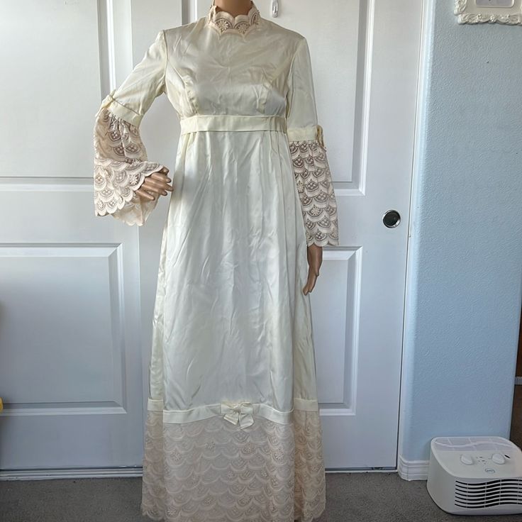 Incredible Estate Sale Find In Euvc Age Yellowing But No Visible Stain. Small Tear To Crinoline In The Sleeve Can’t Be Seen When Worn. Cream Vintage Dress For Wedding, Cream Vintage Floor-length Wedding Dress, Cream Floor-length Vintage Dress For Wedding, Cream Floor-length Vintage Wedding Dress, Vintage Beige Dress For Wedding Night, Vintage Full Length Dress With Lace Trim, Vintage Empire Waist Dress For Wedding, White Fitted Vintage Victorian Dress, Fitted Vintage Victorian A-line Dress