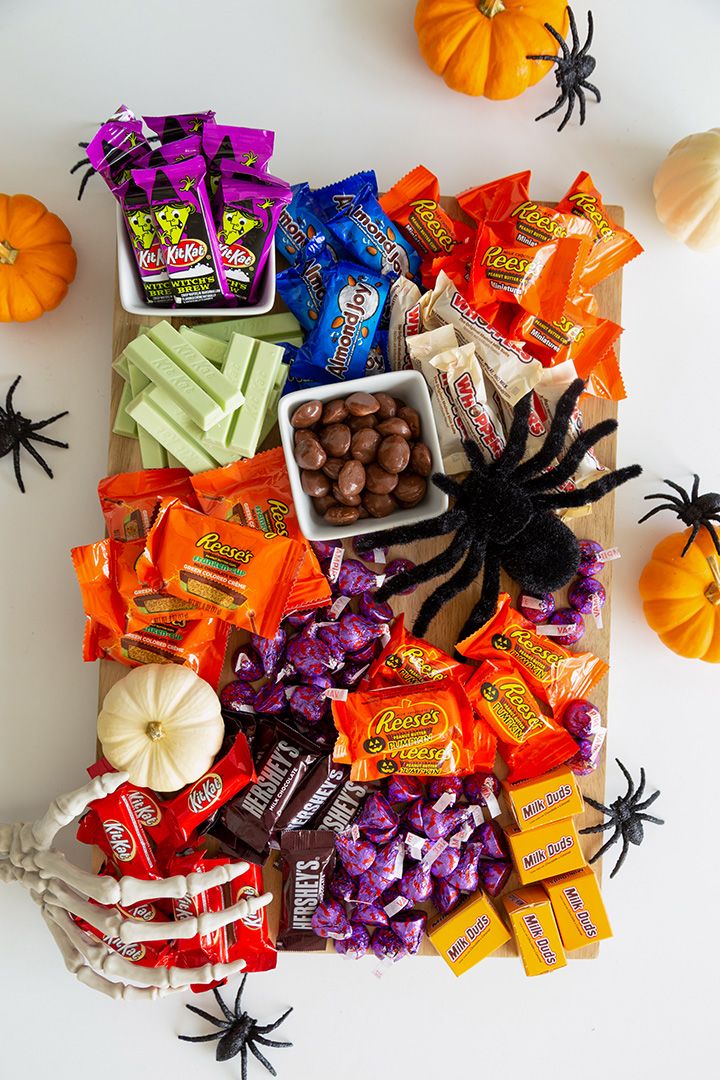 halloween candy and candies laid out on a table