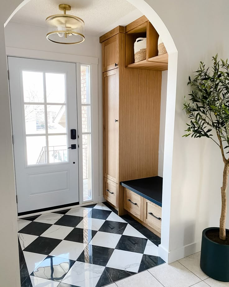 the entryway is clean and ready for guests to use it as a storage area