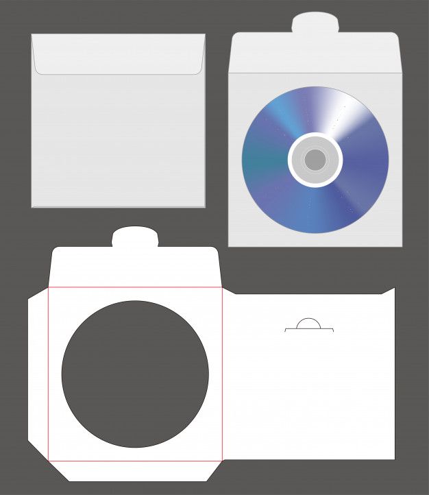 an open folder with a cd and other items to make it look like a camera