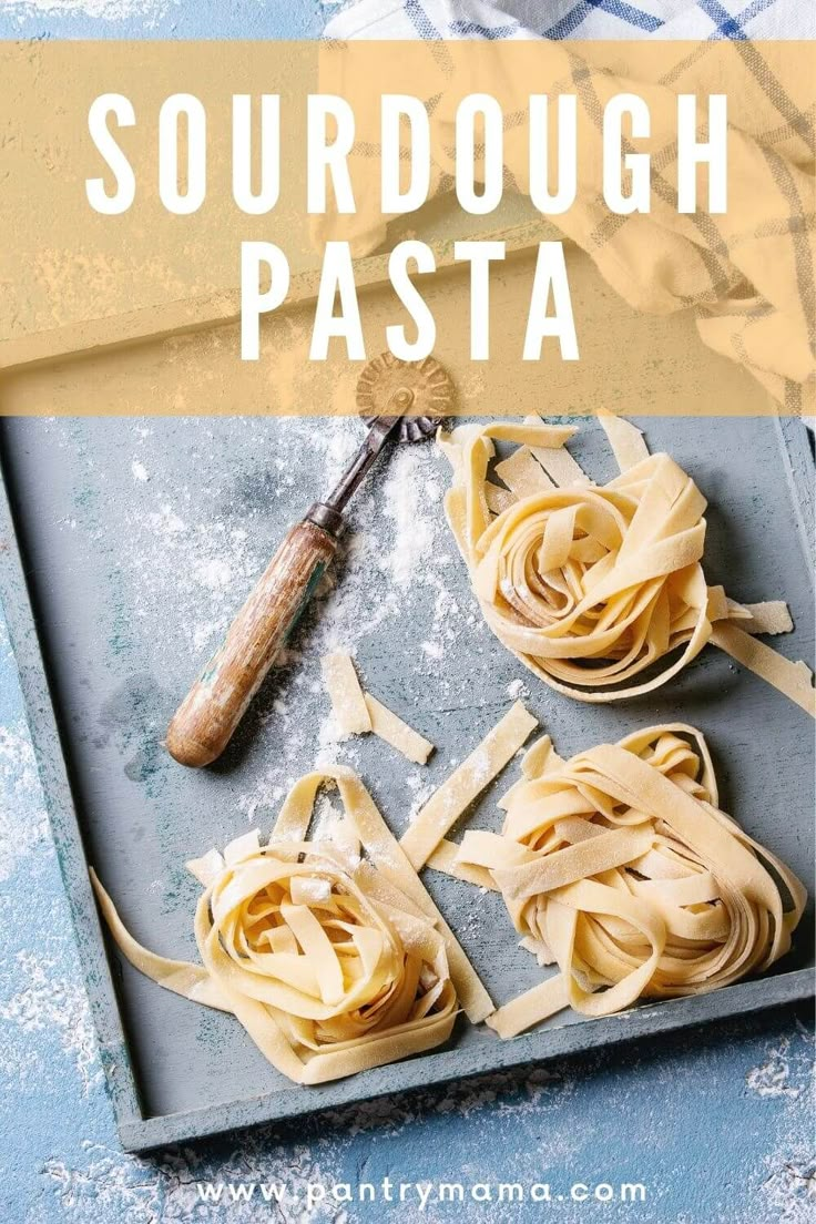 the ingredients for sourdough pasta laid out on a baking sheet