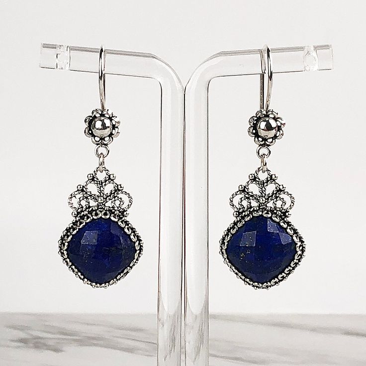 Handmade Artisan Crafted Filigree 925 Sterling Silver Earrings with Genuine Blue Lapis Lazuli Gemstones Material: 925 Solid Sterling Silver Genuine Natural Untreated Blue Lapis Lazuli Gemstones, 12 mm x 12 mm, Square, Faceted Earrings Length: 1.90 inches, Width: 0.65 inches Finishing: Oxidized and Polished Comes with a gift pouch and box Free Domestic Shipping Elegant Sapphire Jewelry Stamped 925, Blue Sterling Silver Earrings For Her, Blue Sterling Silver Earrings As Gift For Her, Nickel Free Blue Earrings As Gift For Her, Elegant Blue Earrings For Gift, Silver Lapis Lazuli Jewelry For Formal Occasions, Silver Lapis Lazuli Jewelry For Formal Events, Sapphire Sterling Silver Jewelry For Jewelry Making, Formal Lapis Lazuli Gemstone Jewelry