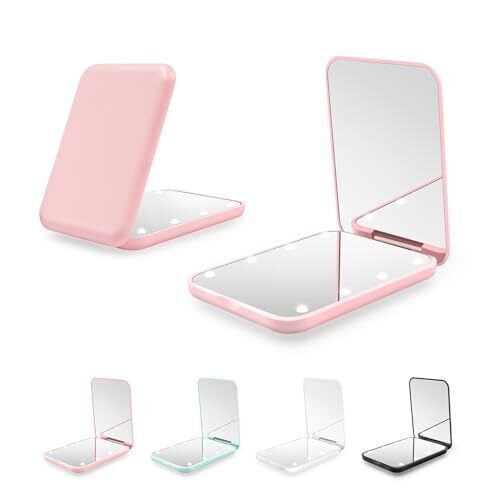 an open pink mirror with three mirrors on each side and four different sections in the middle