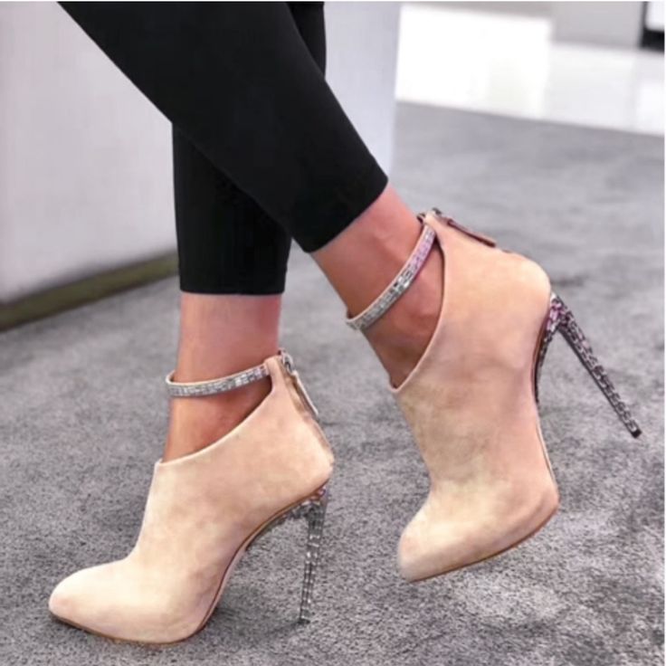 Giuseppe Zanotti For Jennifer Lopez. Suede Bootie Featuring Faceted Crystal Trim, 120-Mm Crystal And Mirrored Stiletto Heel, Pointed Toe, An Ankle Strap, Back Zip, Padded Leather Insole And A V-Shaped Vamp. Color: Nude Material: Sude Size: 38eu Heel Height: 120 Mm / 4.7" Condition: New No Box Eu38 Beige Suede Party Boots, Elegant Ankle Strap Boots For Parties, Elegant Ankle-high Suede Heels, Elegant Heeled Ankle Boots With Strap, Elegant Ankle Strap Boots For Night Out, Evening Suede Boots With Ankle Strap, Beige Ankle Boot Heels For Evening, Elegant Beige Ankle Strap Boots, Elegant High Heel Boots With Wrapped Heel