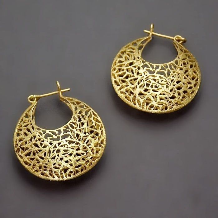 "Handmade large filigree hoop earrings designed with ancient Victorian style. These are cambered to a large basket shape and uneven shapes sawed on it by hand in various sizes. ▸▸ Measurments◂◂ - Diameter of one basket is 3.7cm / 1.5\". - Length: 4.2cm / 1.7\". - The weight of one earring is: 6.5g Also comes at a smaller size: https://www.etsy.com/il-en/listing/76844750 ▸▸ Material◂◂ - Sterling silver - Rose gold or 18k yellow gold coating over sterling silver ear wire and brass basket. Choose t Gold Hoop Earrings With Intricate Design, Festival Brass Filigree Hoop Earrings, Brass Hoop Earrings With Intricate Design, Brass Filigree Hoop Earrings For Festivals, Gold Pierced Hoop Earrings For Festivals, Gold Pierced Hoop Earrings For Festival Wear, Wedding Filigree Hoop Earrings, Brass Filigree Hoop Jewelry, Festival Hoop Filigree Earrings