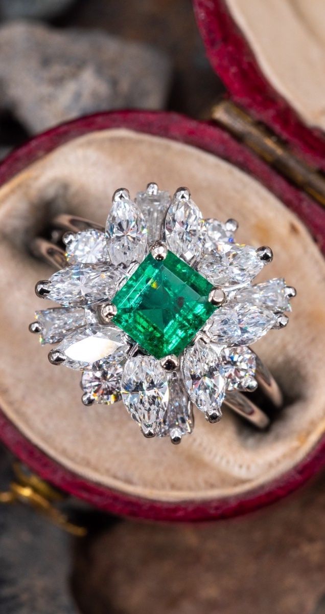 Luxury Green Marquise Diamond Ring, Marquise Emerald Ring With Brilliant Cut, Marquise Brilliant Cut Emerald Ring, Classic Marquise Emerald Ring, Green Marquise Emerald Diamond Ring, Marquise Emerald Diamond Ring In Green, Luxury Emerald Cut Emerald Cluster Ring, Marquise Emerald Diamond Ring, Marquise Emerald Ring With Center Stone