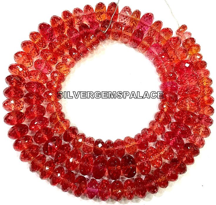 GEMSTONE   PADPARADSCHA SAPPHIRE SHAPE            RONDELLE (FACETED SIZE                 8 To 10.MM (WIDTH LENGTH          18 INCHES LONG NECKLACE.  COLOUR         JUICY PINKISH ORANGE QUALITY          AAAA+ EXTREMELY BEAUTIFUL SAPPHIRE BEADS NECKLACE FOR PERSONAL USE AND GIFT FOR ANYONE. If you have any questions about this item please contact me I will get back to you as soon as. We accept bulk or wholesale orders for any gemstone which you'll get best wholesale prices! Hence you can contact m Orange Sapphire Necklace, Party Faceted Round Beads, Round Gemstone Beads For Party, Crystal Faceted Beads Necklace, Crystal Beaded Necklace With Faceted Round Beads, Round Crystal Beaded Necklaces With Faceted Beads, Faceted Crystal Beaded Necklaces, Crystal Gemstone Round Beads, Sapphire Beads Necklace