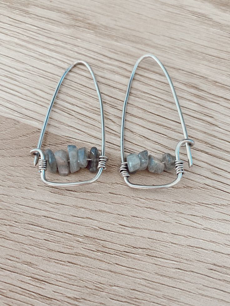 Dainty labradorite stones wire wrapped into these simple handmade hoops. Minimalist Wire Wrapped Labradorite Jewelry, Handmade Labradorite Earrings For Everyday, Handmade Minimalist Labradorite Earrings, Labradorite Stone, How To Make Earrings, Wire Wrapped, Wire Wrapping, Labradorite, Sterling Silver Jewelry