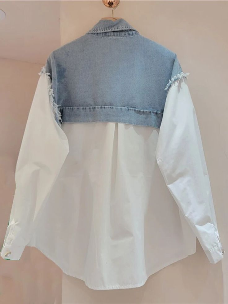 This is perfect for those who are looking for a clothing for a good price. It is fashionable, stylish, and it will look great on anyone who wears it. Do you wanahavit? SIZE Shoulder:49cm Bust:121cm Waist:130cm Sleeve length:54cm Length:72-76cm Note: 1 inch = 2.54 cm, 1 cm = 0.39 inch note: measurement by hands allow 2-3cm errors which is normal Cotton Long Sleeve Tops With Fake Two-piece Detail, Casual Collared Tops With Splicing, Casual Cotton Fake Two-piece Tops, Trendy Blue Patchwork Blouse, Spring Fake Two-piece Blouse, White Fake Two-piece Top For Spring, Blue Patchwork Tops For Work, Blue Patchwork Top For Workwear, Denim Tops For Layering