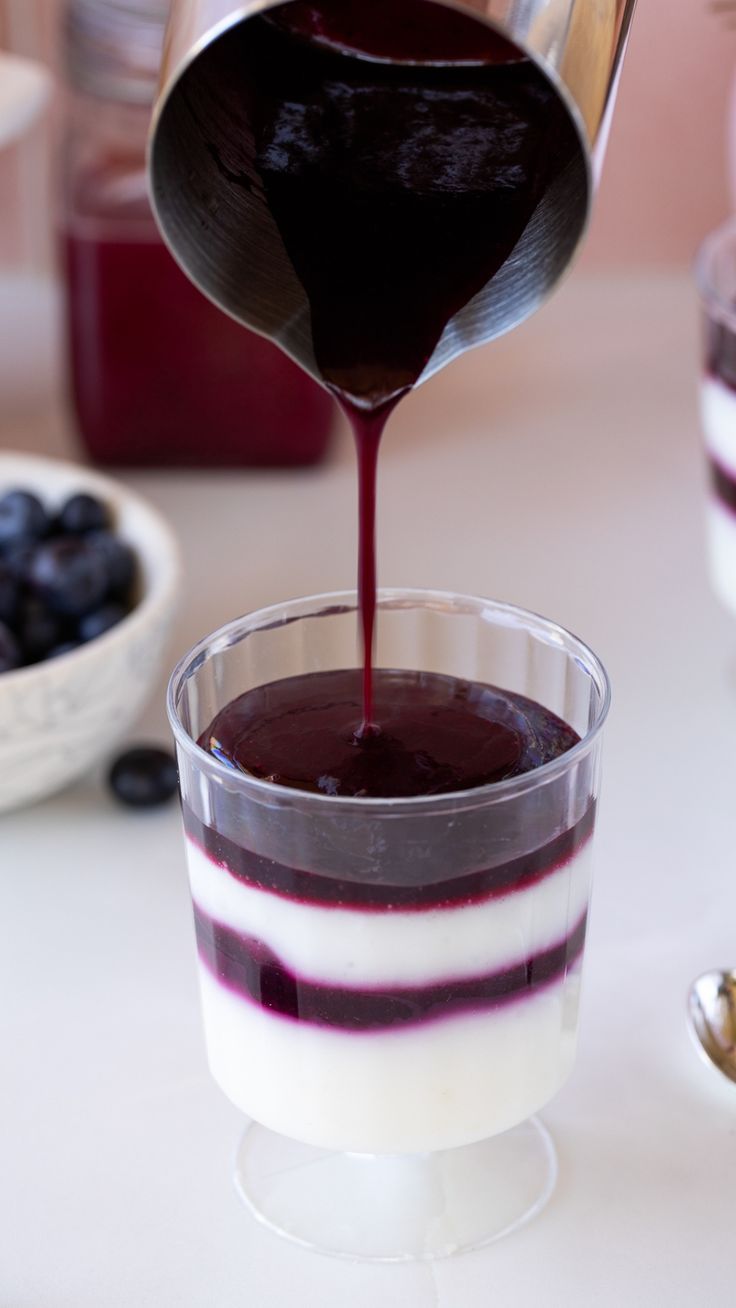 pouring blueberry sauce onto custard. Blueberry Coulis, Coulis Recipe, Fruit Sauces, Flavored Liquor, Cream Pancakes, Fruit Sauce, Blueberry Sauce, Easy Blueberry, Berry Fruit