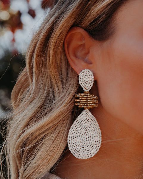 Elegant Beaded Jewelry For Vacation, White Teardrop Beaded Earrings For Beach, Gold Beads Teardrop Earrings For Party, Gold Beaded Dangling Earrings For Beach, Elegant Teardrop Beaded Earrings For Beach, White Beaded Earrings With Gold Beads For Wedding, Gold Dangling Beads Earrings For Beach, Party White Earrings With Gold Beads, Summer Gold Beaded Chandelier Earrings