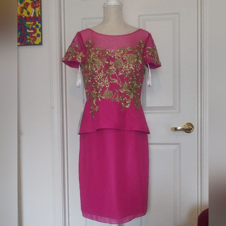 Beautiful Special Occasion/ Wedding/ Office Party Dress. Hot Pink, Gold Applique, Sheer Upper Body, Hidden Back Zipper. Lined, Self Bra, No Stretch. Nwt Fits 10/12 Best. Smoke Free, Pet Free Home. Your Purchased Will Be Packed In A Clean Sanitized Environment. Thanks For Shopping! Pink Short-sleeved Evening Dress For Wedding, Pink Short Sleeve Evening Dress For Wedding, Pink Sleeveless Mother Of The Bride Dress For Wedding, Sleeveless Pink Mother Of The Bride Dress For Wedding, Fitted Peplum Wedding Dress, Festive Formal Feminine Dresses, Feminine Festive Evening Dresses, Elegant Ruffled Dress For Mother Of The Bride, Feminine Evening Dresses For Festive Occasions