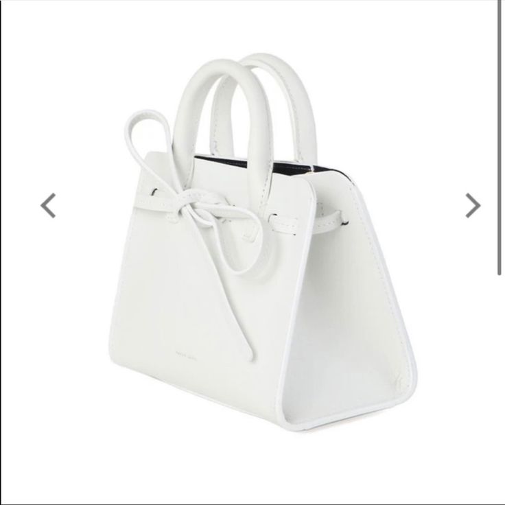 New In Pink Box And With Dust Bag Mansur Gavriel Mini Mini Sun Bag In White. Yes These Are Brand New So You Can Gift It To Your Friend, Wife, Gf, Sister, Mom, Etc. Please Message Me If You Have Any Questions. Also Selling A Pink One In Separate Listing. Both Colors Are Brand New. Sold Out, They Are Not Making The Sun Bag Line Anymore. Luxury White Pouch Box Bag, Designer White Box Bag With Dust Bag, Luxury White Box Bag With Handles, Designer White Box Bag With Double Handle, Designer White Tote Box Bag, Designer White Crossbody Box Bag, Luxury White Pouch Satchel, White Double Handle Satchel As Gift, Designer White Satchel As Gift