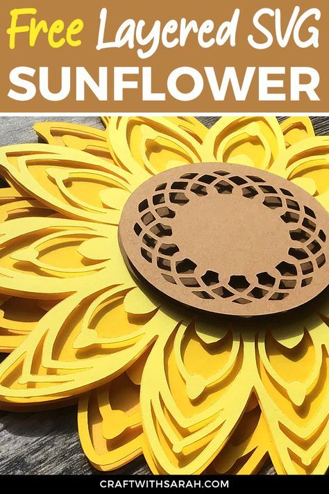 a sunflower with the text free layered svg sunflower cut out on it