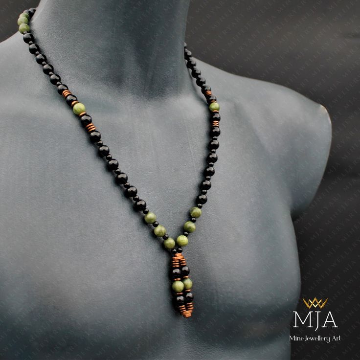 Jade Necklace, Black Onyx bead Necklace, Handmade Jade, And Onyx Yoga Necklace, Good Luck Jewelry, Copper Hematite Stone Summer Necklace - The Necklace 24 Inc - Other designs www.etsy.com/shop/minejewelleryart The handmade necklace is made of a jade onyx hematite Pendant, 8 mm jade beads, 8,4 mm black onyx beads, copper hematite stone accessory, and black nylon cord, at the ends I used lobster claw. The products are custom-made and done of their kind. They can be differentiated at the minimum le Black Necklaces With Round Natural Stones, Black Gemstone Beads Necklace For Healing, Black Beaded Necklaces With Natural Stones For Gifts, Black Necklaces With Gemstone Beads For Healing, Black Necklace With Gemstone Beads For Healing, Black Necklace With Healing Gemstone Beads, Obsidian Necklace With 8mm Beads As Gift, Traditional Long Black Necklace, Black Spiritual Beaded Necklaces With Polished Beads