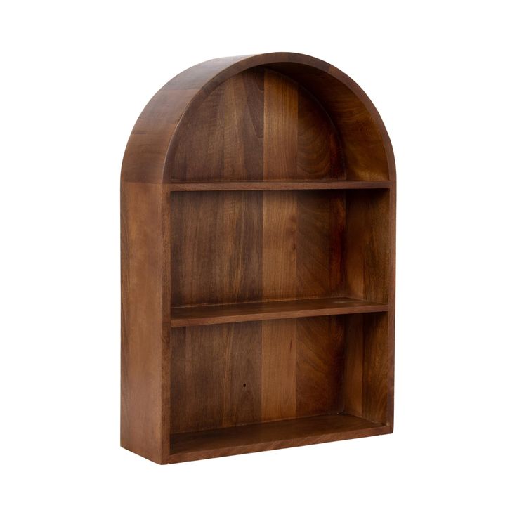 a wooden book shelf with an arched design