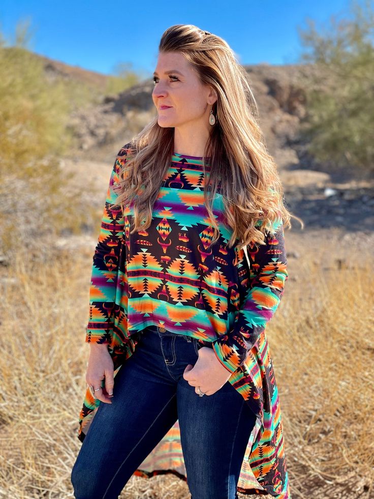 Dakota Hi-Low top – The Feisty Bull Boutique Colorful Long Sleeve Tops For Fall, Colorful Pattern Long Sleeve Tops For Fall, Colorful Pattern Long Sleeve Fall Tops, Multicolor Festival Tops For Fall, Colorful Pattern Tops For Fall, Long Sleeve Multicolor Print Blouse For Fall, Casual Long Sleeve Tops With Colorful Pattern, Multicolor Geometric Pattern Top For Fall, Fall Multicolor Geometric Pattern Top