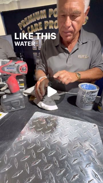 an older man is working on some metal