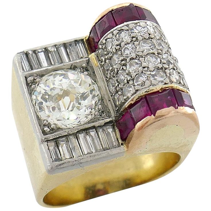 Stunning Retro ring created in Europe in the 1940's featuring an exceptional rare cut diamond with the characteristics of both, rose and brilliant cuts, called the JUBILEE cut. The diamond weight was estimated as approximately 1.85-carat, N color, VS1 clarity. The ring is asymmetrical and holds also single and baguette cut diamonds and table cut rubies. The ring is made of 14 karat yellow gold, the diamonds are set in 18 karat white gold, the rubies - in 14 karat rose gold. This is a very though Art Deco Diamond White Ring With 17 Jewels, Art Deco Diamond Ring With 17 Jewels, Art Deco Diamond Rings With 17 Jewels, Vintage Diamond Signet Ring With Brilliant Cut, Vintage Diamond Signet Ring With Rose Cut Diamonds, Art Deco Brilliant Cut Diamond Signet Ring, Art Deco Diamond Cluster Ring With 17 Jewels, Art Deco Ring With 17 Jewels In Round Cut, Art Deco Ring In Diamond White With Jewels