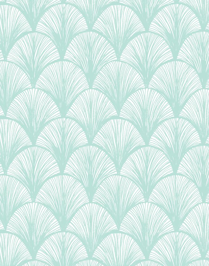 an art deco wallpaper pattern in aqua green and white with fan shaped shapes on it