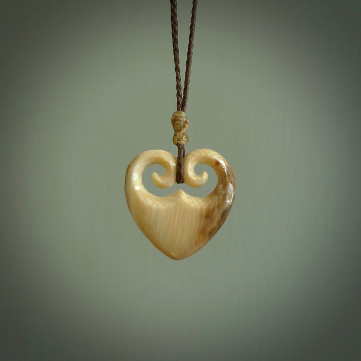 Love Carved in Ancient Material Love is eternal with IMMORTAL's beautiful Woolly Mammoth tusk heart pendants, hand carved with intricate koru filigree for a truly special token of affection. Show the one you love that your bond is unbreakable. We had our mammoth material carbon dated to get an accurate measure of its age. The testing was done for us by GNS Science, a New Zealand Crown Research Institute and New Zealand's leading provider of Earth, geoscience and isotope research - so their asses Nature-inspired Carved Natural Jewelry, Natural Carved Necklaces As Gift, Heart-shaped Carved Jewelry Gift, Heart Shaped Carved Jewelry Gift, Carved Heart-shaped Jewelry For Gift, Carved Heart Shaped Jewelry Gift, Carved Heart Jewelry Gift, Love Is Eternal, Woolly Mammoth