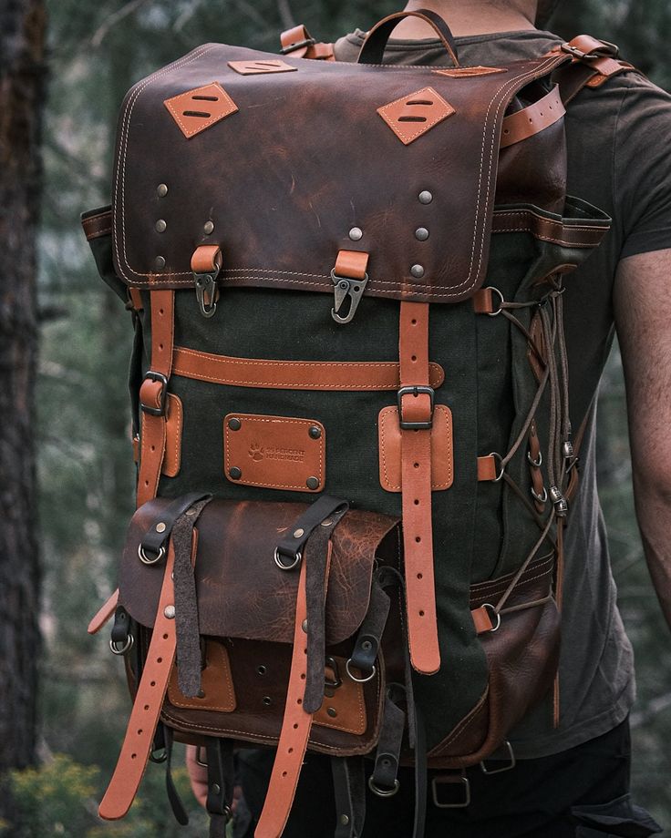 FEATURES: Vegetable taning leather. 100% Double Waxed Canvas The fabric is quite thick and, because it is waxed, it is extremely water resistant. Using As bushcraft backpack, camping backpack, outdoor backpack, hiking backpack, daypack, trekking backpack 2 Laptop compartment  Detachable Waist Belt Detachable Shoulder Bet  Dimensions 58x35x20 inside regular 40 liters, irregular +45 Liters + Pockets size 48x32x18 inside regular 30 liters, irregular + 35 Liters + Pockets size Colours: Green Model N Leather Backpack With Leather Backing For Outdoor, Brown Leather Outdoor Backpack, Casual Leather Backpack For Outdoor Activities With Waxed Finish, Casual Leather Backpack With Waxed Finish For Outdoor, Brown Leather Backpack For Outdoor, Rugged Brown Backpack For Outdoor, Vintage Backpack With Leather Handles For Outdoor, Vintage Leather Backpack For Outdoor With Leather Handles, Vintage Leather Backpack With Leather Patch For Adventure