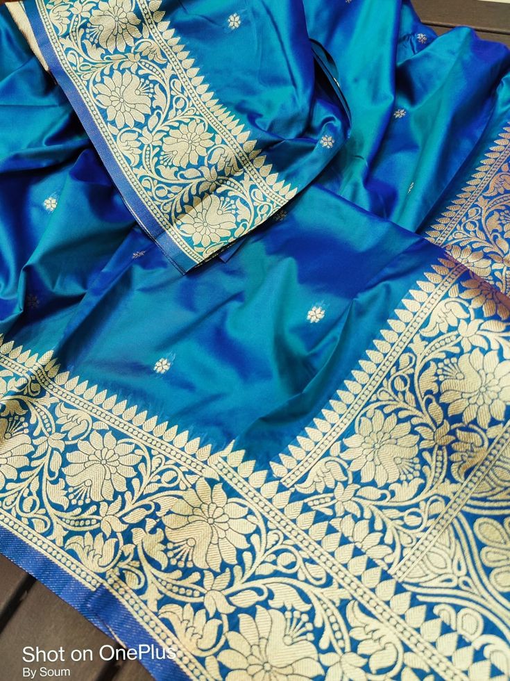 Here we are presenting Gorgeous party ware Semi katan Benarasi silk saree.Beautifuly designed with Minakari floral motif zari weaving. Rich border with rich pallu ,will give a splendid look for any weeding ceremony or party or gifting. Running Blouse piece available. Saree is soft light weight easy to carry. More color available. Diwali Paithani Silk Dupatta With Tilla, Traditional Tilla Detail Paithani Silk Lehenga, Traditional Tilla Lehenga In Paithani Silk, Traditional Paithani Silk Lehenga With Tilla Details, Traditional Paithani Silk Lehenga With Tilla, Traditional Lehenga In Paithani Silk With Tilla, Katan Silk Sets For Festivals And Celebrations, Festive Paithani Silk Traditional Wear With Tilla Details, Paithani Silk Dupatta With Tilla For Puja