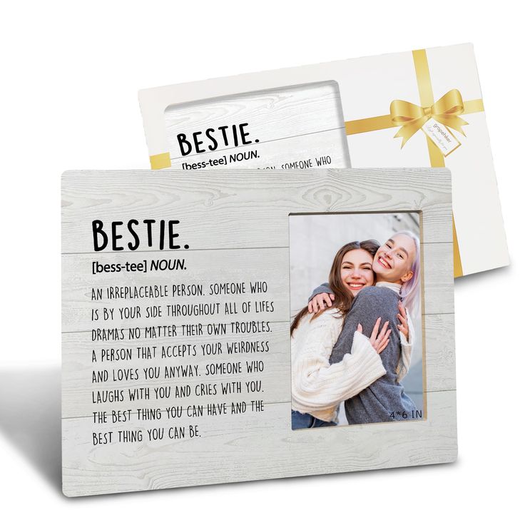 a white wooden frame with an image of two women hugging each other and the words bestie on it