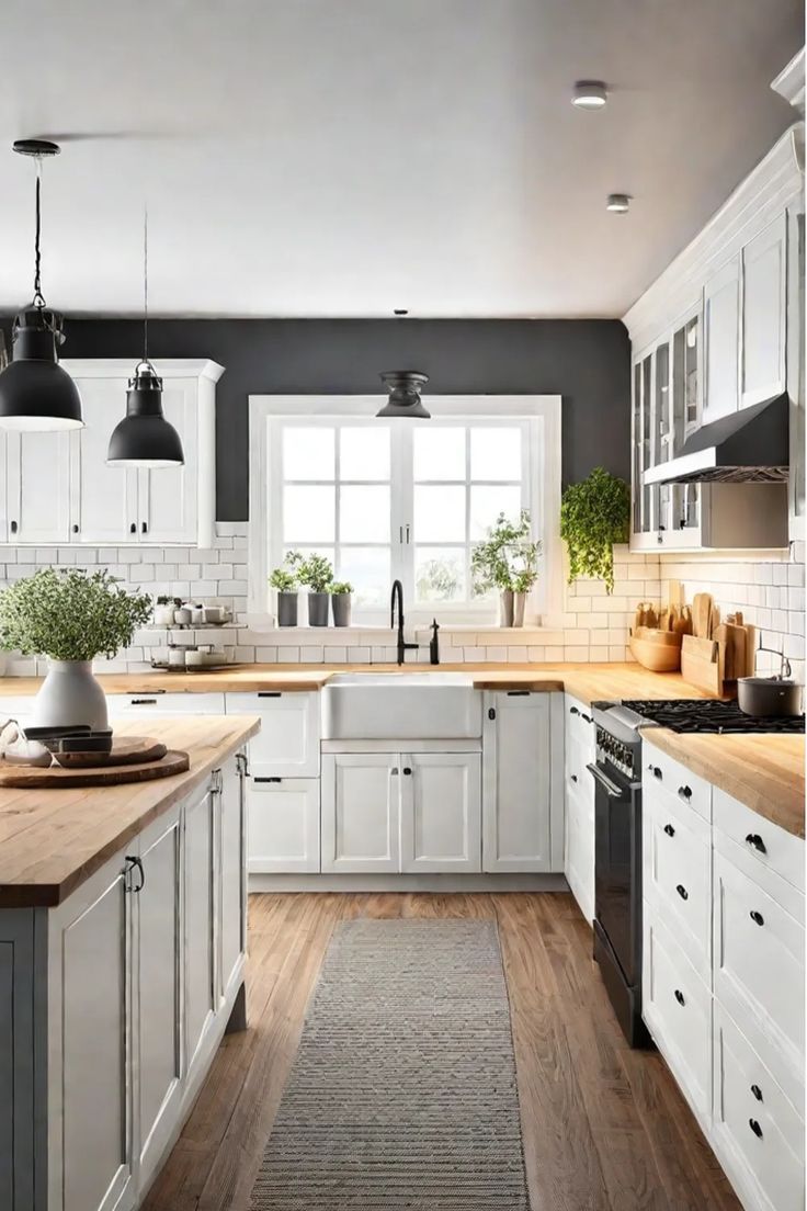 the kitchen is clean and ready for us to use it's white cabinetry