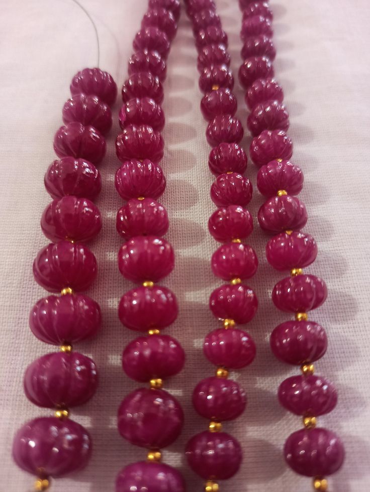 Ruby Pumpkin Natural Ruby Corundum Carving Pumpkin Beads Round Beads Gemstone String 1.Ruby Pumpkin shape 2. Ruby Corundum 3. 112 -carat weight - Approx -11 mm Size - 3.5 inch 9 piece String 4. 170 -carat weight - Approx - 10 mm Size - 6.5 inch 19 piece String 5. 167 -carat weight - Approx - 9 mm Size - 8 inch 25 piece String 6. 169 -carat weight - Approx - 8 mm Size - 10 inch 30 piece String 7, The necklace is with tassel because you can easily adjust your necklace length. 8. If you want any ch Festive Faceted Oval Beads, Festive Oval Faceted Beads, Polished Round Beads For Jewelry Making, Ruby Beaded Necklaces With Polished Round Beads, Round Polished Beads For Jewelry Making, Ruby Necklaces With Polished Round Beads, Ruby Beaded Necklaces With Round Beads, Elegant Ruby Gemstone Beads, Spiritual Polished Gemstone Beads