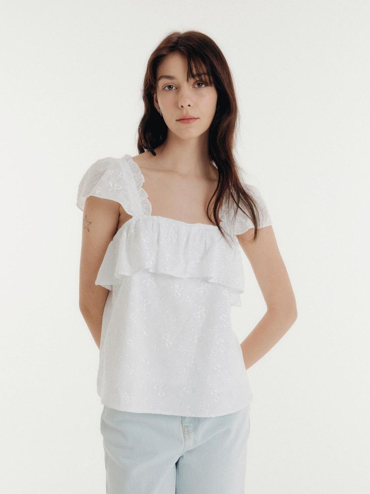 This is a casual and trendy top by CLAIR DE SAGE that is made out of high quality and sturdy material. With distinctive mood of the design and comfortable wear, you can style it for your casual daily outfit.- Light fabric suitable for summer season- Short puffy sleeves with ruffles- Trendy and feminine mood White Cotton Short Sleeve Summer Top, Trendy Summer Short Sleeve Top With Ruffles, White Cotton Short Sleeve Top For Summer, Casual Summer Blouse For Daywear, Fitted White Short Sleeve Top For Spring, Casual White Cotton Blouse, Chic Relaxed Fit Tops With Ruffles, Chic Short Sleeve Tops For Summer, Summer Tops For Daywear