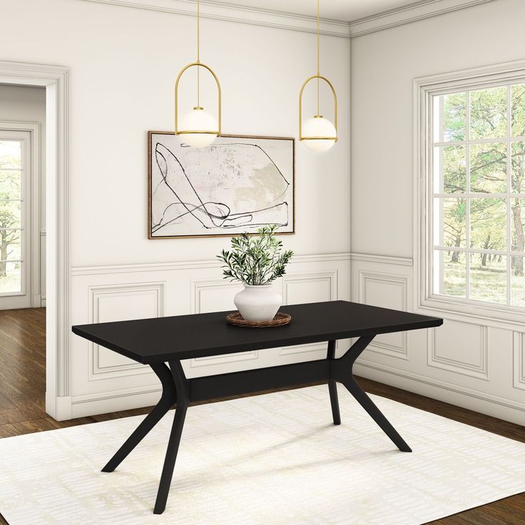 a dining room with a black table and white rug