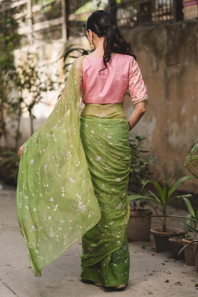 Light green chiffon saree with floral zari embroidery all over. Comes with unstitched blouse piece. 
Components: 2
Pattern: Embroidered
Type Of Work: Floral
Fabric: Chiffon
Color: Green
Other Details: 
Floral embroidery
Note: The stitched blouse worn by the model is not for sale
Occasion: Destination Wedding - Aza Fashions Green Silk Pre-draped Saree With Resham Embroidery, Green Resham Embroidered Cotton Silk Blouse Piece, Green Organza Blouse Piece With Zari Work, Green Organza Blouse With Resham Embroidery, Green Chanderi Blouse With Sheer Dupatta, Chanderi Green Blouse For Reception, Green Chanderi Blouse For Reception, Green Organza Bollywood Blouse, Green Organza Blouse For Festivals