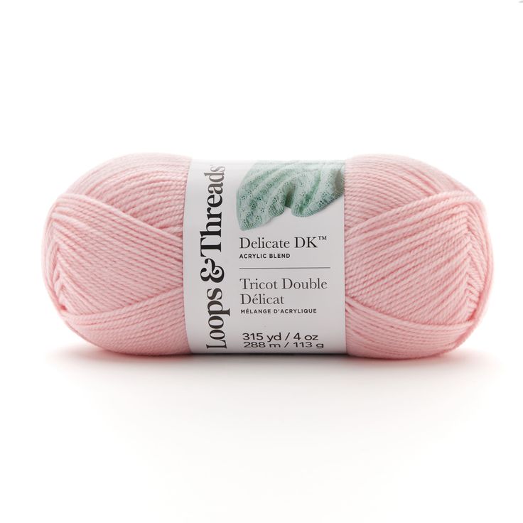 a pink ball of yarn with a green leaf on it's end and the words, delicate dk