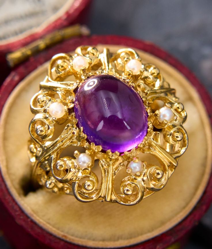 Victorian Oval Pearl Ring With Gemstone, Victorian Oval Cabochon Pearl Ring, Amethyst Cabochon Ring For Wedding, Elegant Yellow Gold Amethyst Cabochon Ring, Elegant Yellow Gold Cabochon Amethyst Ring, Cabochon Amethyst Ring For Wedding, Purple Cabochon Amethyst Wedding Ring, Gold Oval Amethyst Cabochon Ring, Wedding Amethyst Cabochon Ring In Fine Jewelry Style