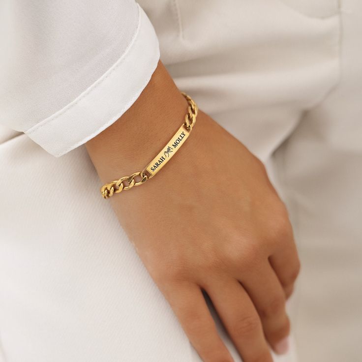 Celebrate the unique connection between friends with our Personalized 18K Gold Plated Bracelet. Featuring elegant engravings of names and meaningful symbols, this bracelet symbolizes the bond shared and is a stylish accessory for everyday wear. Size: Designed for a comfortable fit, with detailed sizing available in our infographic guide. Material: Premium quality 18K gold plated over sturdy stainless steel for lasting wear. Durability: Constructed to be waterproof and hypoallergenic, ideal for s Elegant Tarnish Resistant Charm Bracelet For Friendship, Customized Minimalist Jewelry For Friendship, Dainty Personalized Bracelets For Friendship, Engraved Charm Bangle Bracelet For Gift, Engraved Charm Bangle Bracelet Gift, Engraved Bangle Charm Bracelet Gift, Yellow Gold Bracelets For Friendship And Mother's Day, Yellow Gold Bracelets For Friendship On Mother's Day, Yellow Gold Bracelets For Mother's Day And Friendship