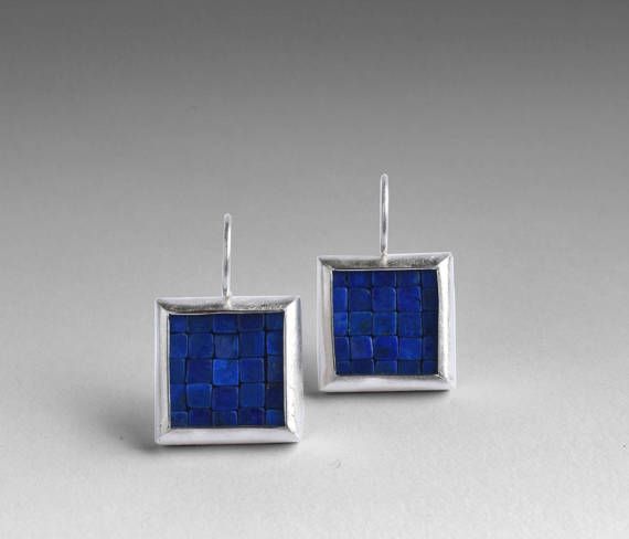 These colorful earrings are made with lapis lazuli and a combination of fine silver and sterling silver. Each earring has been bezel set with natural lapis lazuli in pretty, dark blue colors with occasional inclusions of silvery pyrite.  The silver has been surface brushed and burnished to Mosaic Earrings, Blue Gemstone Earrings, Mosaic Jewelry, Earrings Square, Dark Blue Color, Colorful Earrings, Square Earrings, Earrings Blue, Blue Gemstones