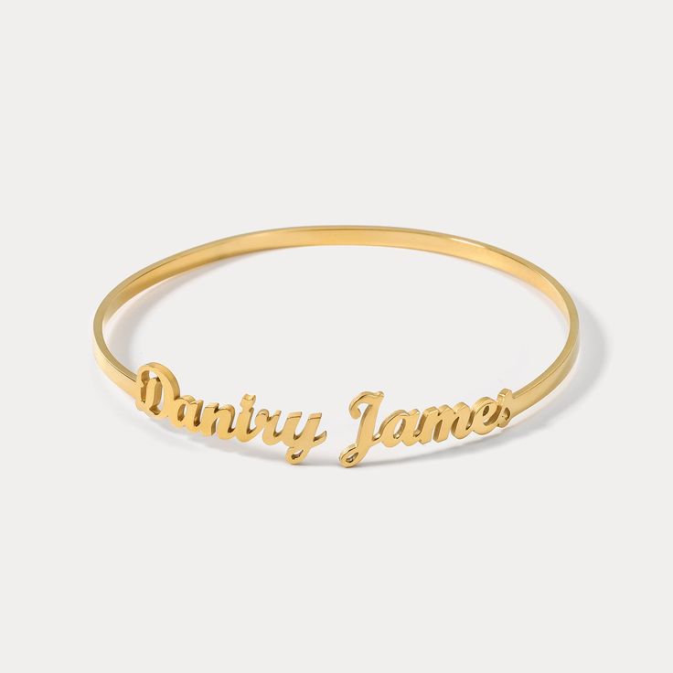 Be on top of the fashion game with this personalized cuff bracelet! Add your name or a special phrase for a unique look that's sure to turn heads. Not to mention the compliments that’ll be rolling in! (Ain't no outfit complete without it!) DETAILS Plating: 18K Gold Materials: 18K Gold on Steel Measurements:  Adjustable 2.76"*2.76"(7cm*7cm) Weight:  7.0 g * Please allow 15-20 days for customing before shipping Personalized Name Bracelet As A Trendy Gift, Personalized Name Bracelet Trendy Style, Personalized Name Bracelet For Trendy Gift, Custom Name Bangle Bracelet For Personalized Gift, Adjustable Custom Name Bracelet, Custom Name Nameplate Bracelet For Friendship, Custom Name Adjustable Bracelet, Meaningful Custom Name Adjustable Bracelet, Adjustable Custom Name Bracelet Bangle