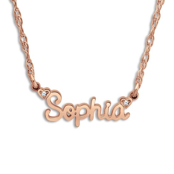 Personalize the perfect gift for a loved one or yourself with this meaningful high-polish name necklace, punctuated with two shimmering diamond accents. Fashioned in 14K rose gold, the 18-inch rope chain secures in place with a spring ring clasp.Free personalization! May be personalized with your choice of 1 name (3 to 8 characters). Rose Gold Birthstone Name Necklace For Anniversary, Rose Gold Diamond Birthstone Necklace For Anniversary, Anniversary Rose Gold Name Necklace With Birthstone, Personalized Rose Gold Birthstone Necklace For Anniversary, Anniversary Rose Gold Diamond Birthstone Necklace, Anniversary Rose Gold Birthstone Name Necklace, 14k Gold Rose Gold Name Necklace, Rose Gold Name Necklace For Valentine's Day Anniversary, Personalized Rose Gold Name Necklace With Birthstone