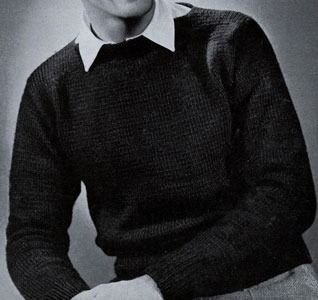 an old black and white photo of a young man wearing a sweater with a collar